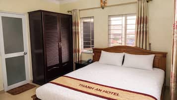 Deluxe Double Room, City View | Desk, blackout curtains