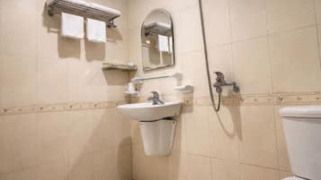 Shower, free toiletries, hair dryer, slippers