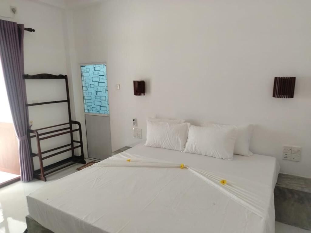 Deluxe-Dreibettzimmer, Balkon, Gartenblick