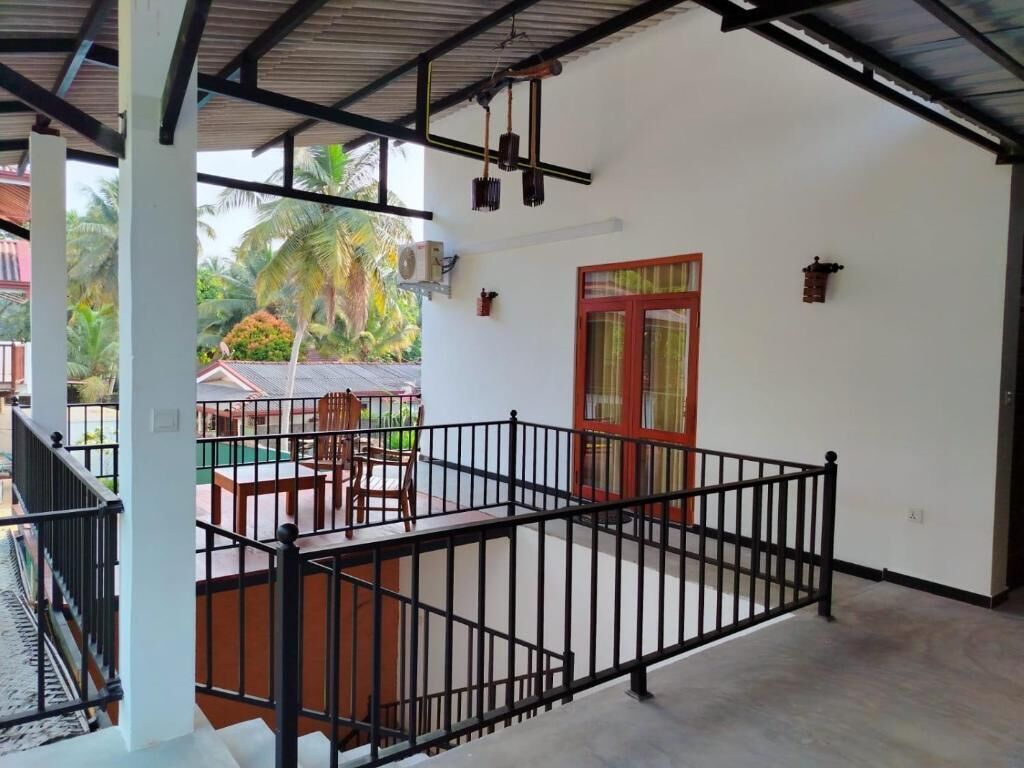 Deluxe Double Room, Balcony, Garden View | Property grounds