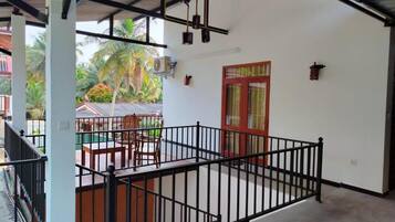 Deluxe Double Room, Balcony, Garden View | Property grounds