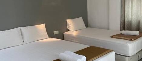 Chambre triple Standard | AccĂšs au Wi-Fi (inclus), literie fournie