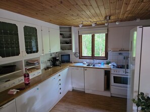 Coffee/tea maker, fridge, stovetop, dishwasher