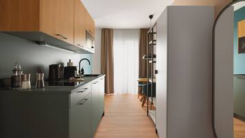 Comfort Suite mit Balkon | Eigene Küche | Espressomaschine, Wasserkocher