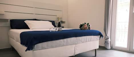 Luxury Suite, Sea View | In-room safe, iron/ironing board, free WiFi