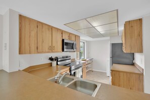 Fridge, microwave, oven, stovetop - 2B/2B Fairview Isles 226 Condo, Walk to Beach, Heated Pool! (Fort Myers Beach)