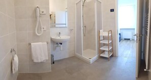 Shower, free toiletries, hair dryer, towels