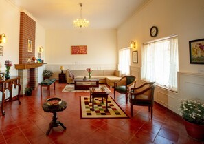 Living room - Magnolia by Nature Resorts & Stays (Coonoor)