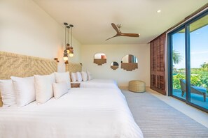 A bedroom with two beds, a ceiling fan, a large window with a view, and a woven headboard. - Condo Ensue o in Punta Mita (Punta de Mita)