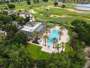 A large estate with a swimming pool, tennis courts, and a golf course. - Luxury Seven Eagles Townhome in Reunion Resort (Kissimmee)