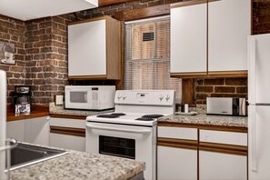 Fridge, microwave, oven, stovetop - Garden Apartment Near Forsyth Park, Walkable & Convenient by Lucky Savannah (Savannah)