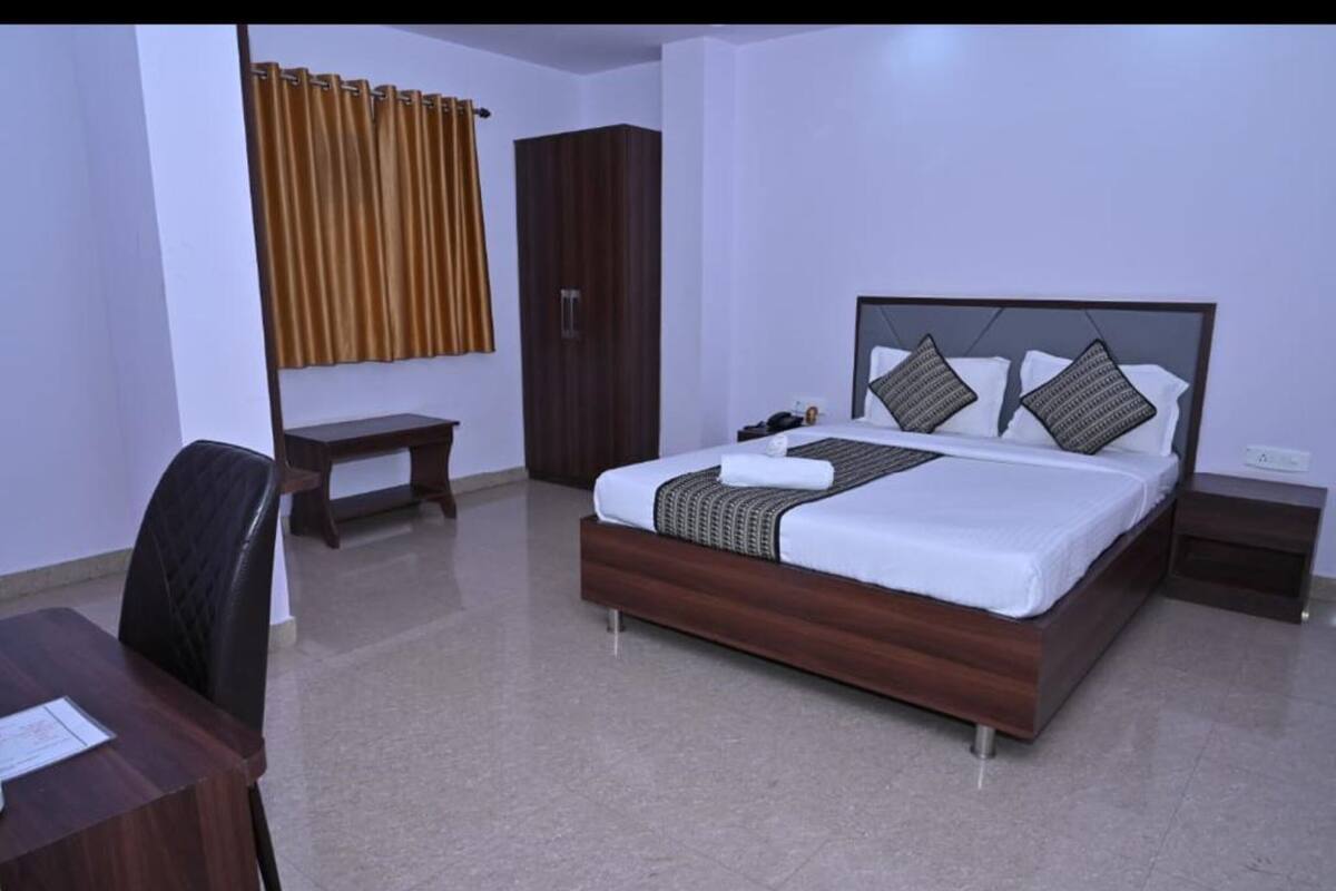 Quarto casal luxo, vista para a cidade