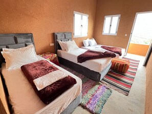 Quarto casal família, vista para a montanha