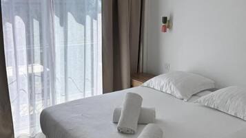 Double Room, Balcony, Sea View | Blackout drapes, soundproofing, iron/ironing board (on request)