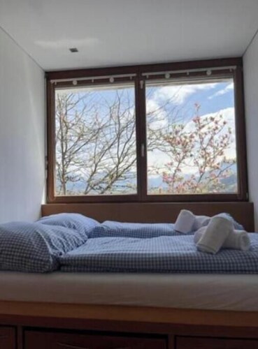 Villa Noomi - Elegant design villa with mountain views, garden & fireplace in Frastanz