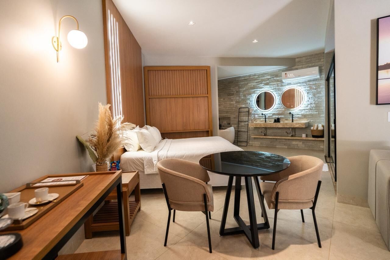 Luxury Suite, Garden View | Desk, laptop workspace, free WiFi