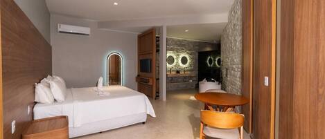 Luxury Suite, Garden View | Desk, laptop workspace, free WiFi