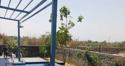2BHK villa in 16k sqft farmhouse wth view f mini forest nd arawali mountain rnge