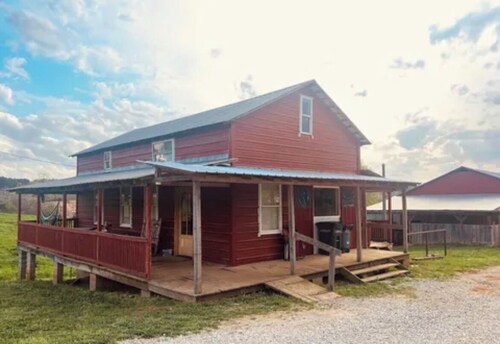 Relax to the hum of alpacas just off the balcony of this former Amish store