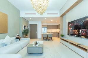 Apartment, City View | Living area | 75-inch Smart TV with cable channels - Burj Khalifa Luxury 2BR - High Floor (Dubai)