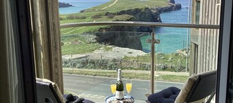 Ocean Front top floor apartment, with far-reaching views. Sleeps 4.