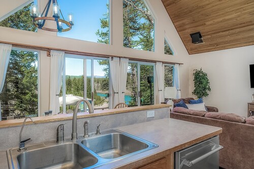 Peaceful Escape by the Water. Relax with the whole family at this peaceful place to stay. Tucked in the woods with breathtaking views of the river. Fire pit, large deck, river access and so much more!