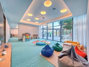 Children’s area - Elegant 2BR Opera Apartment | Balcony • Pool Access • Free Parking (Dubai)
