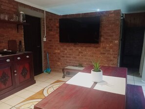 House, 1 Bedroom, Patio, Pool View | Living room - The Cornerstone BnB - South Africa (Mbombela)