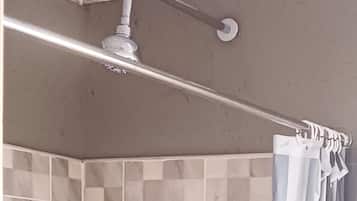 Shower, towels, soap, toilet paper