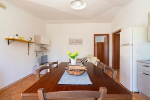 Dining - Apartment 'Casa delle Mimose near the sea' with private terrace, Wi-Fi and air conditioning (Cardedu)
