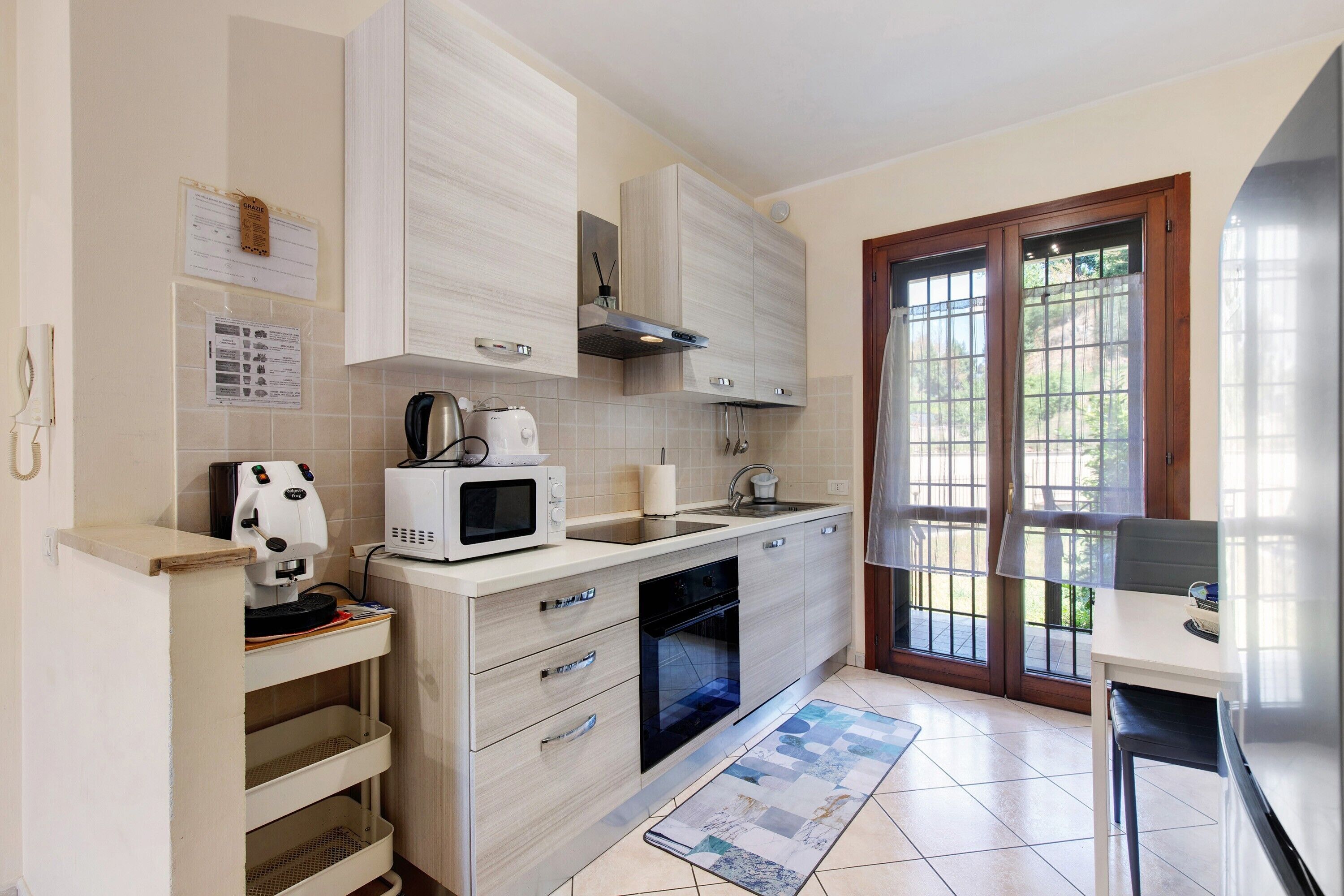 Coffee/tea maker, fridge, microwave, oven