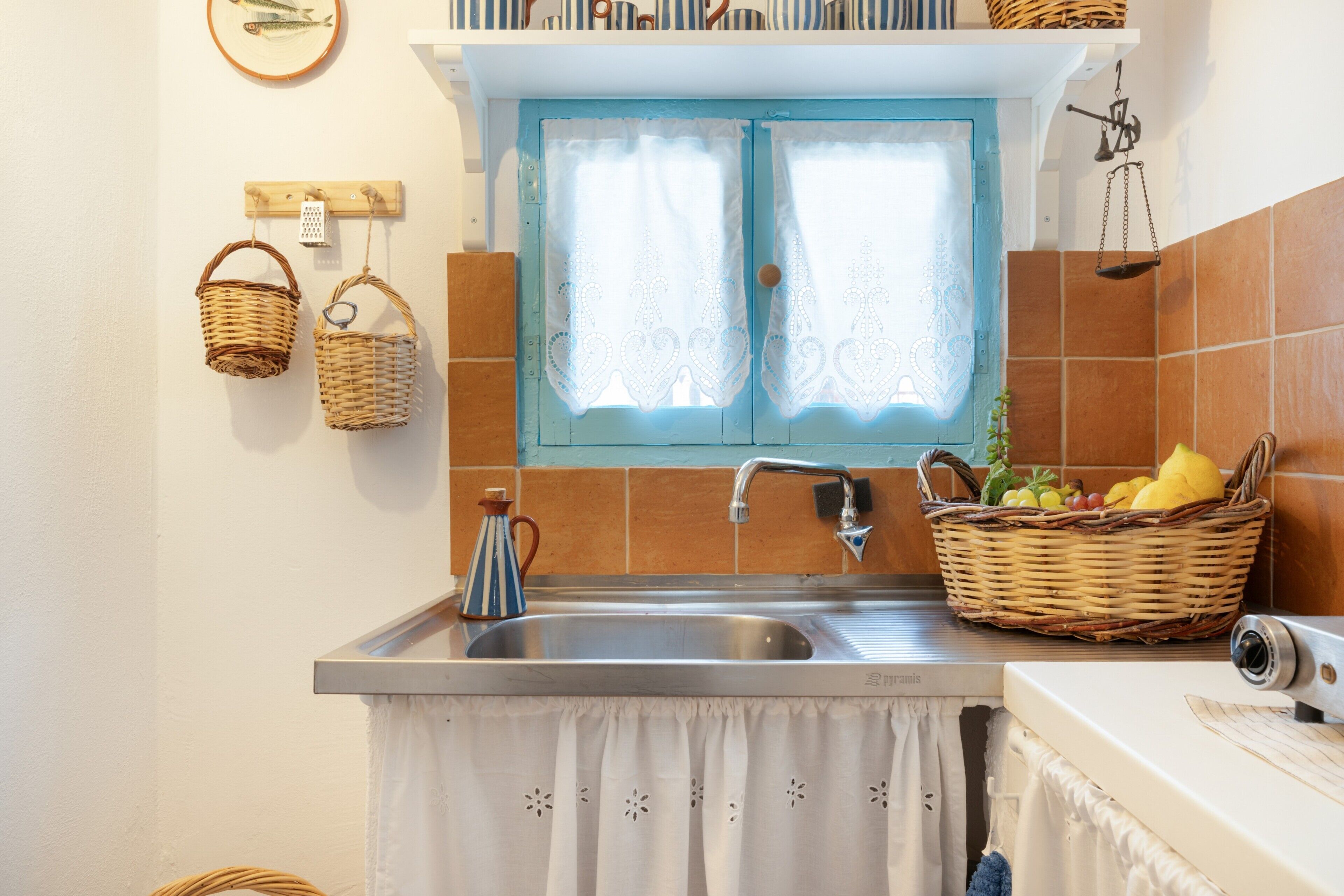 Fridge, stovetop, coffee/tea maker, electric kettle