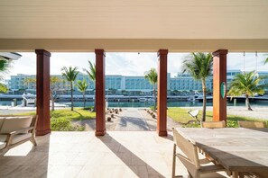 Outdoor dining - Private Island House with dock, minutes from Hilton hotel and casino (Bailey Town)