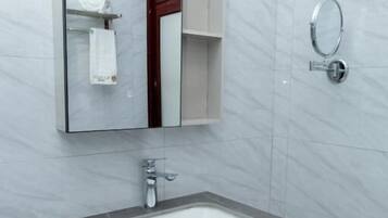 Shower, towels, soap, shampoo