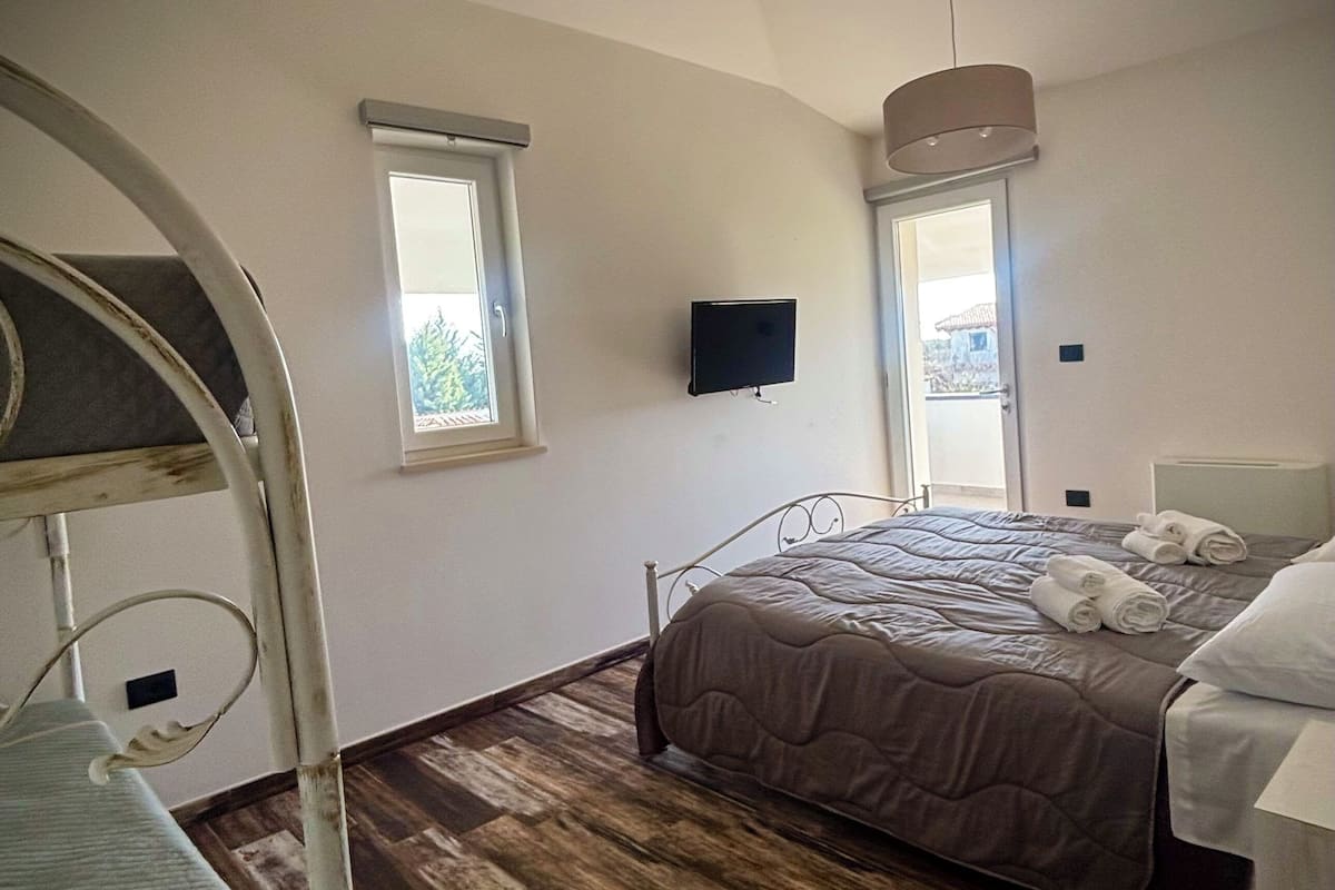 Deluxe Quadruple Room, Balcony, Garden View