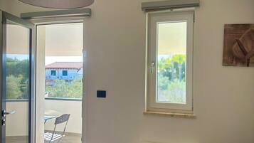 Deluxe-Vierbettzimmer, Balkon, Gartenblick | Aussenbereich