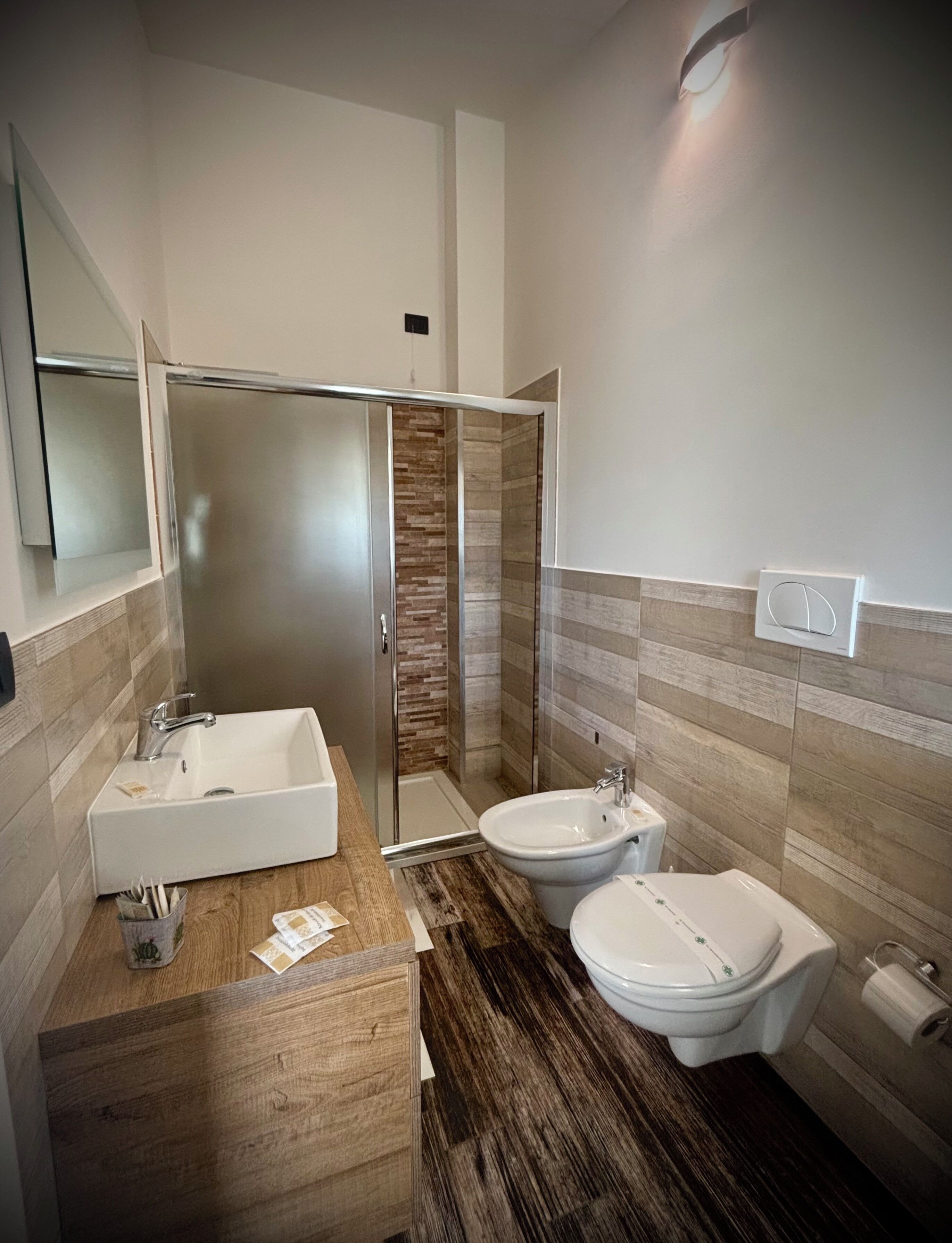 Shower, hair dryer, towels, toilet paper
