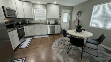 Coffee/tea maker, fridge, microwave, oven