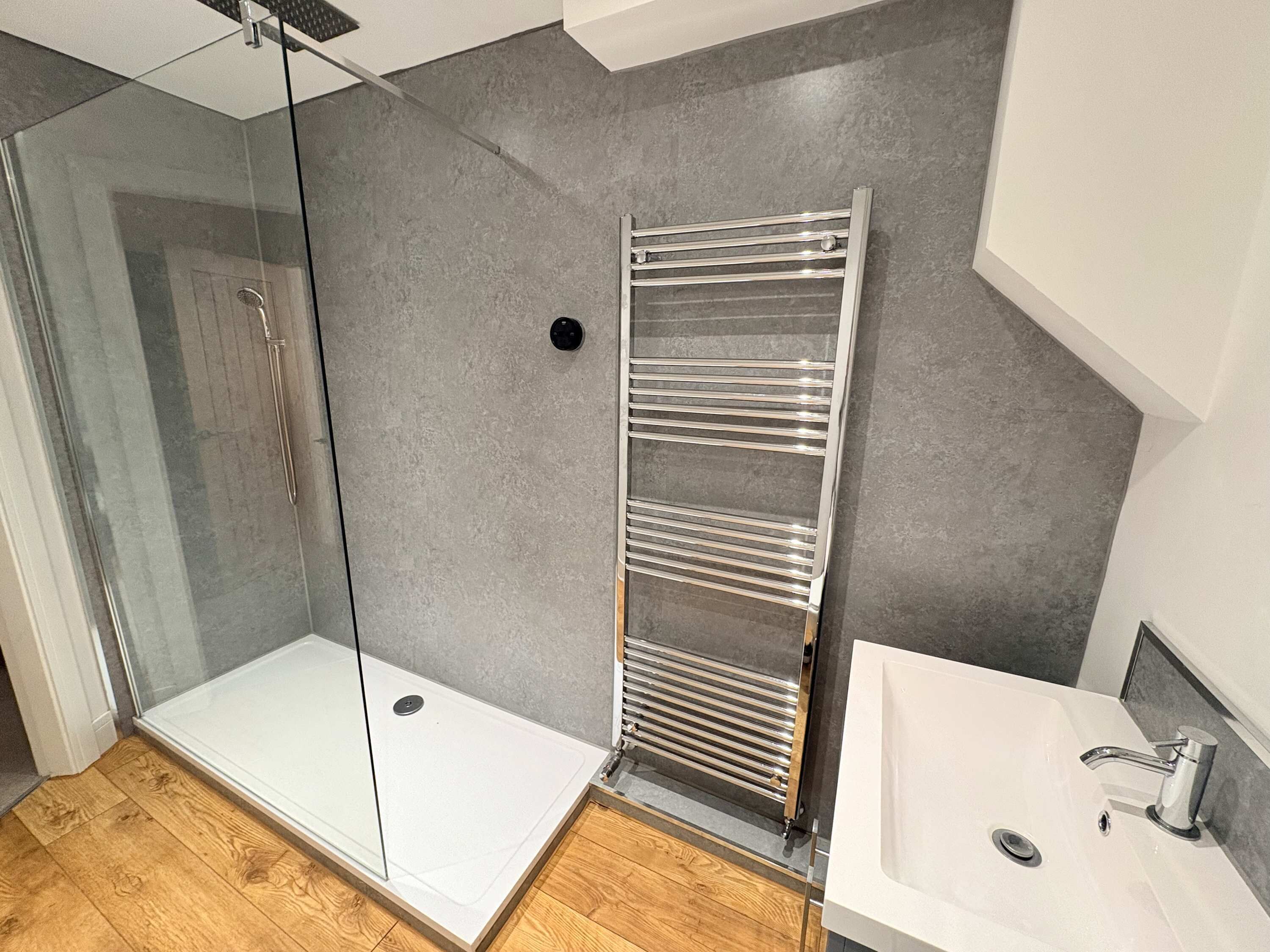 Shower, hair dryer, towels, shampoo