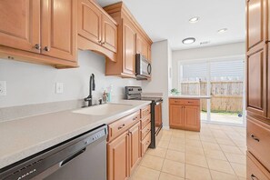 Fridge, microwave, oven, coffee/tea maker - Newly Renovated VB Retreat | Comfort & Space Home (Virginia Beach)