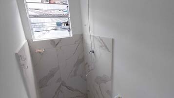Shower, towels, toilet paper