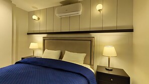 Departamento Deluxe, 3 habitaciones | Escritorio, espacio para trabajar con laptop y wifi gratis 