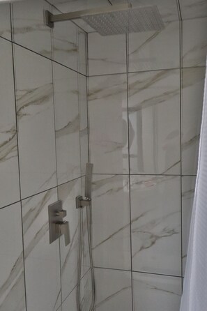 Shower, towels, toilet paper