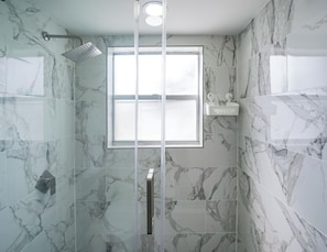 Shower, hair dryer, towels, soap