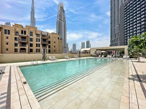 Apartment, Balcony, City View | Pool - Spacious 2BR with Burj Khalifa View (Dubai)