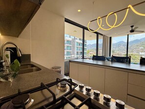 Private kitchen - Designer 2BR w/ Rooftop Pool, Gym & Stunning Views (Puerto Vallarta)
