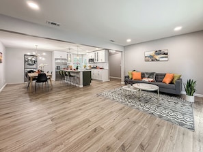 A modern living space with a dining area, kitchen, and seating area. - Mountain Views and Breeze Spacious Home with In law Suite 20 mins Ventura  Beach (Simi Valley)