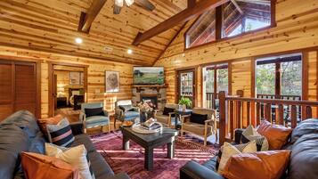 Superior Cabin, Mountain View | Living area | 43-inch Smart TV with digital channels, fireplace