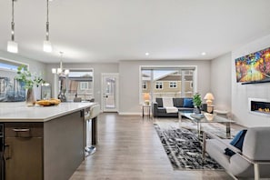 Living room - Silverado Getaway + Golf Sim/Theatre + EV Charger (Calgary)