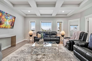 Living room 2 - Silverado Getaway + Golf Sim/Theatre + EV Charger (Calgary)